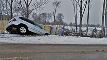 Image of a car crashing into the woods, Auto Aid Collision, Auto Body Shop Repair Blog